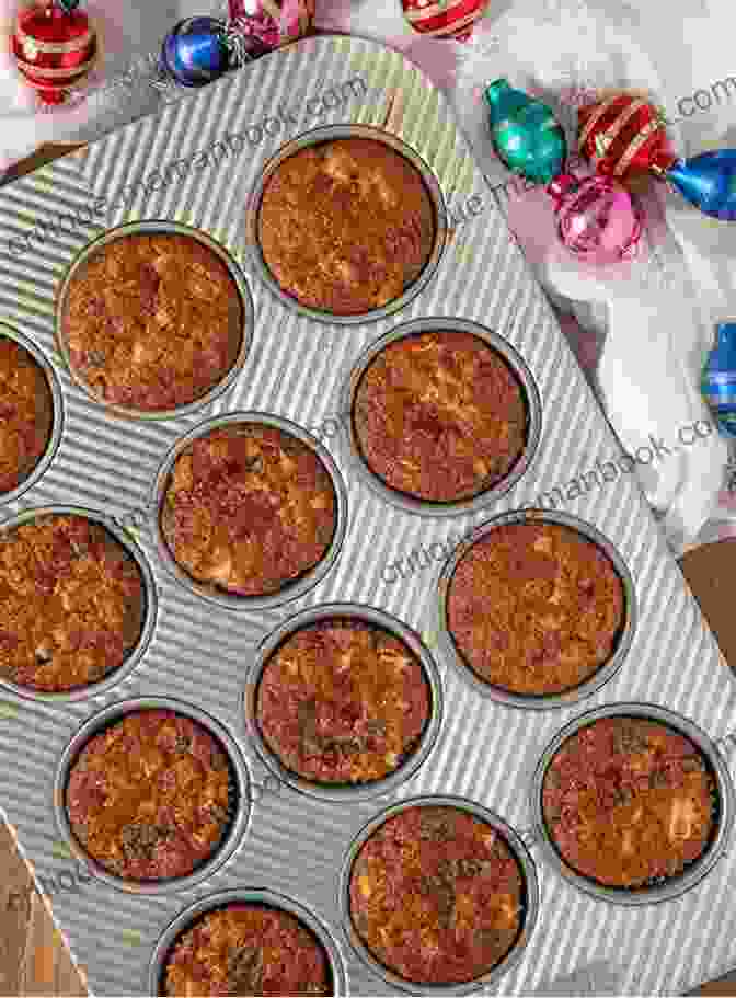 A Muffin Tin Filled With Golden Brown Fruit Muffins Bake It: More Than 150 Recipes For Kids From Simple Cookies To Creative Cakes