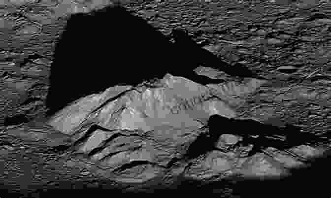 Close Up View Of A Lunar Mountain Peak, Revealing Its Sharp Edges, Jagged Contours, And Delicate Shadows Seeing The Moon Frank Andres